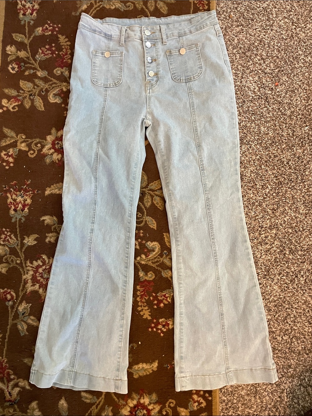 High-Rise Light Blue Flare Jeans with Button-Fly